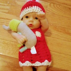 Realistic baby doll girl with crocheted outfit/hat and stuffy